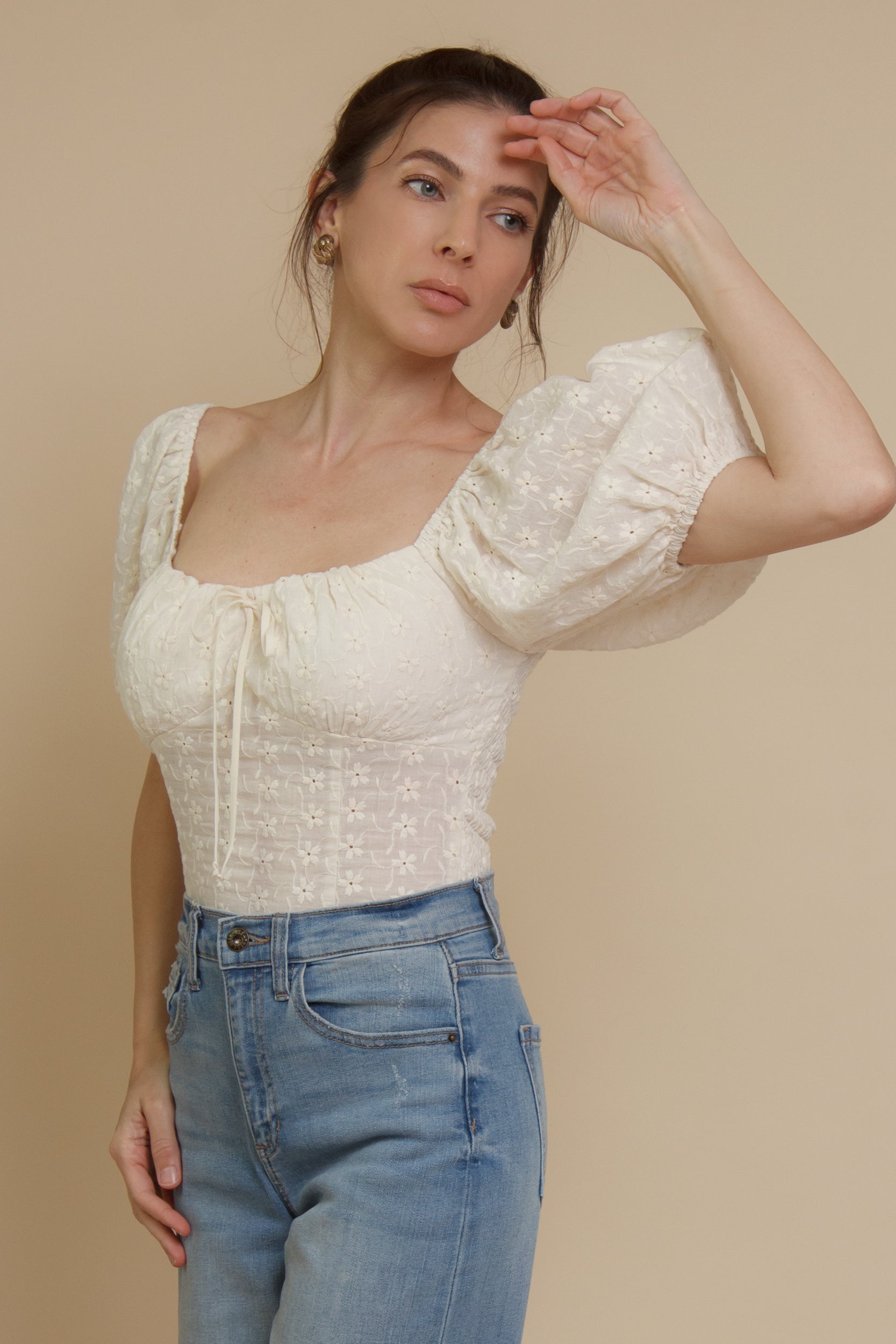 Embroidered eyelet floral, puff sleeve peasant top, in ivory.