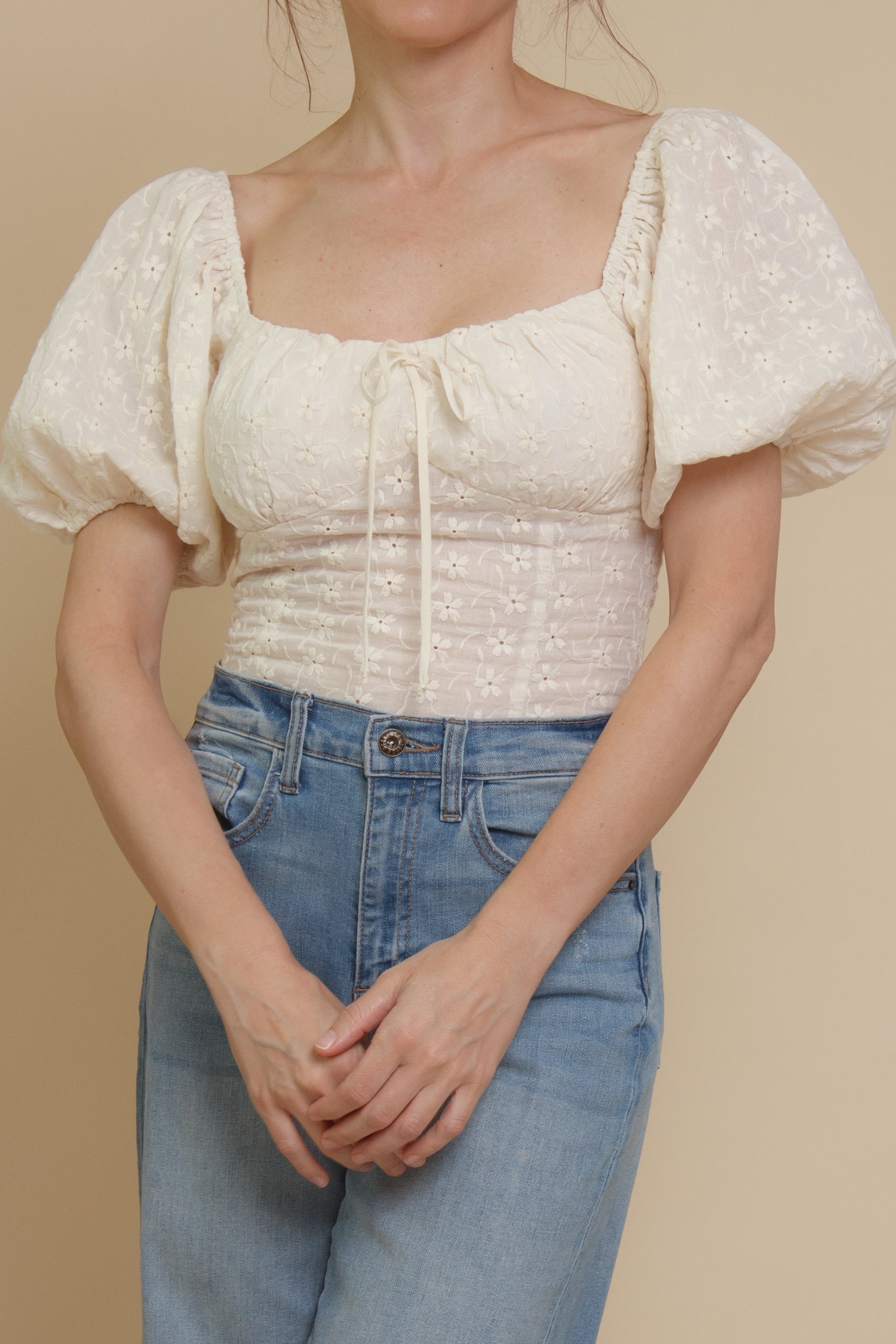 Embroidered eyelet floral, puff sleeve peasant top, in ivory.