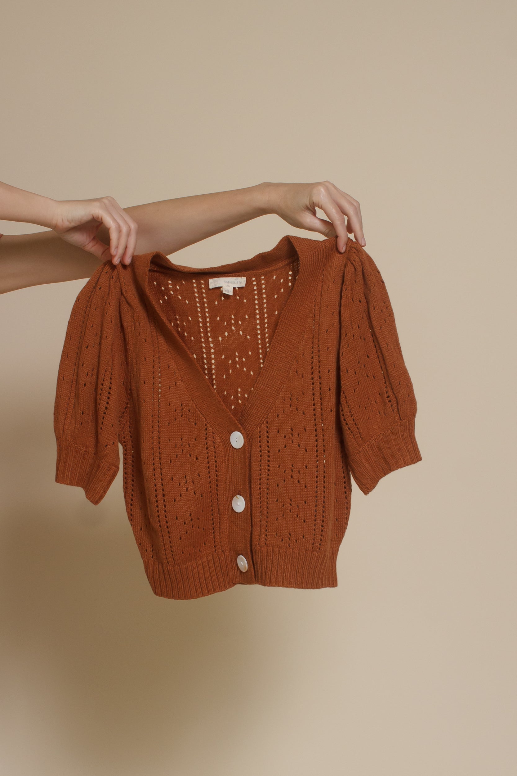 Endless Blue eyelet short sleeve cardigan, in gingerbread.