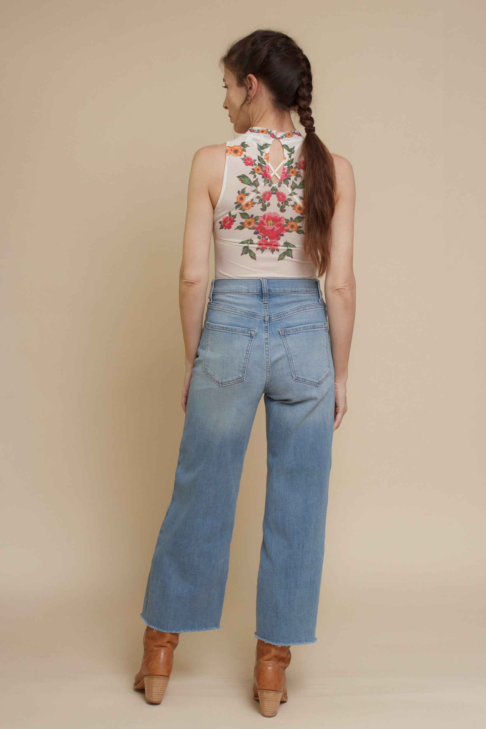Floral mesh bodysuit, in cream.