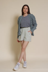 In Loom pointelle knit pom pom cardigan, in sage.