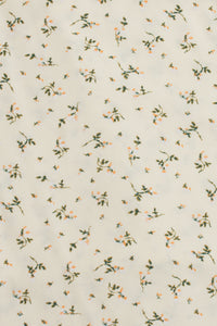 Floral print, wrap style bodysuit, in light yellow.