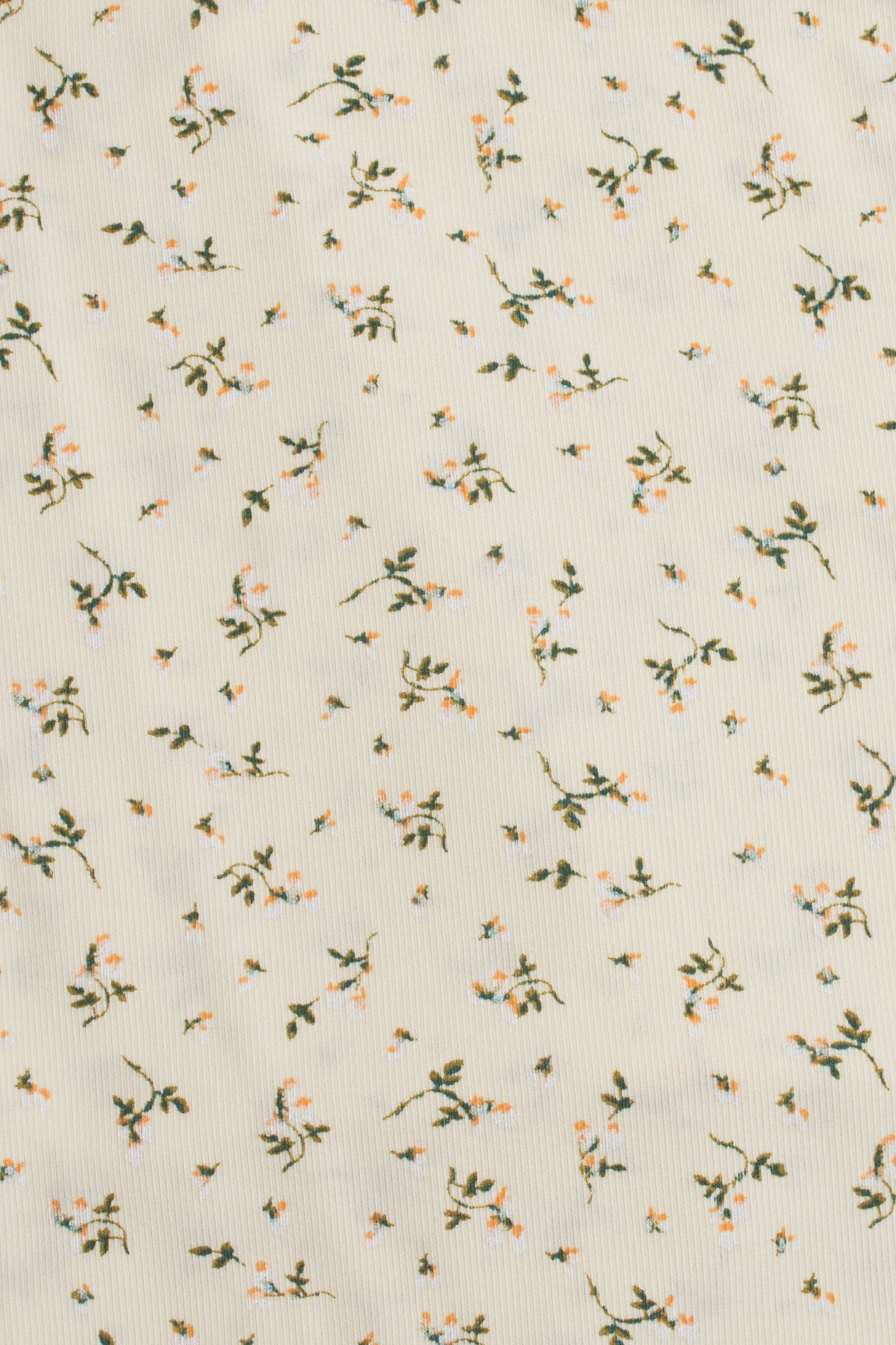 Floral print, wrap style bodysuit, in light yellow.