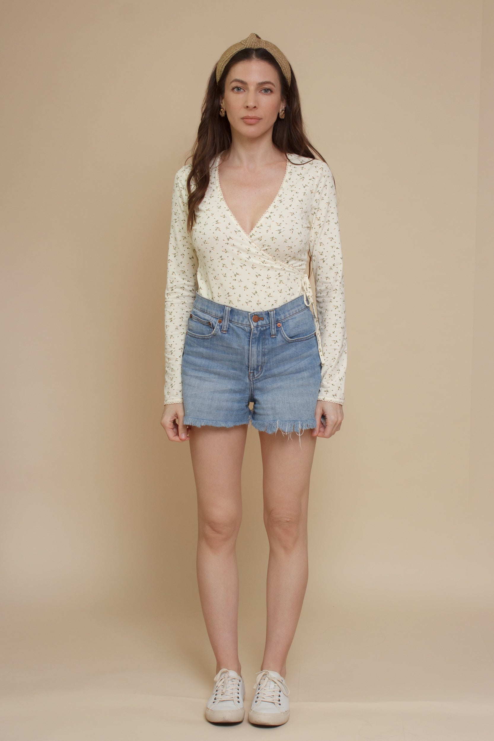 Floral print, wrap style bodysuit, in light yellow.