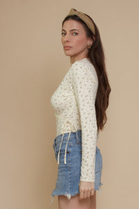 Floral print, wrap style bodysuit, in light yellow.