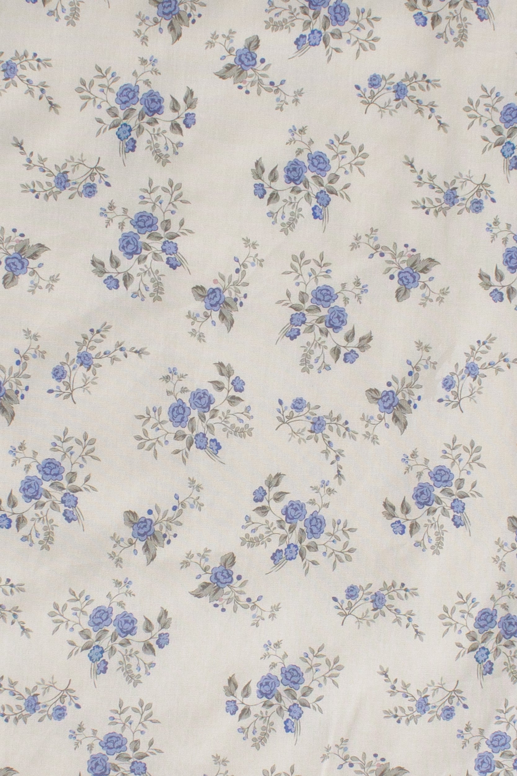 Storia short sleeve smocked midi dress, in blue floral. (fabric swatch)