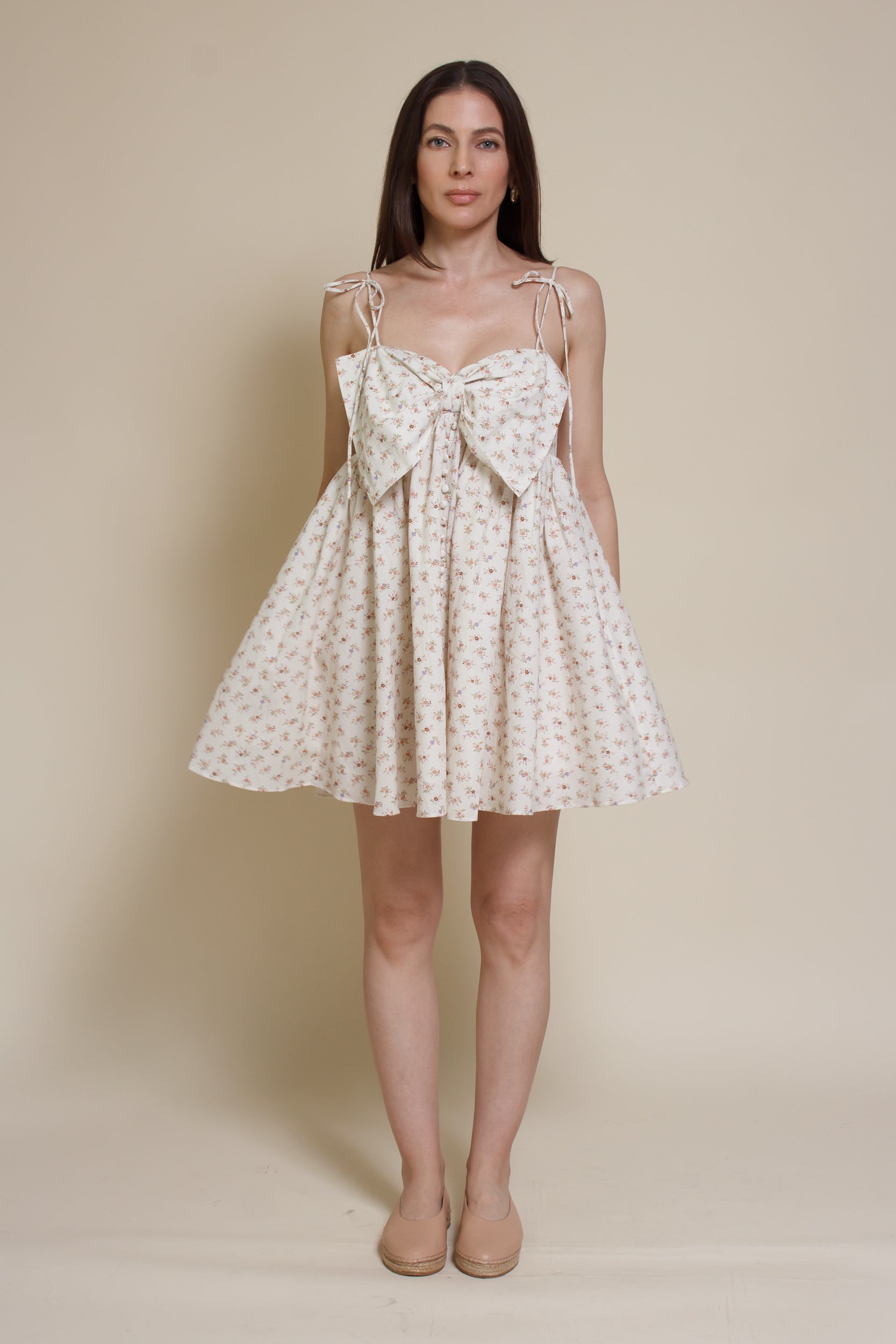 Storia ditsy floral bow front mini dress, in cream multi.