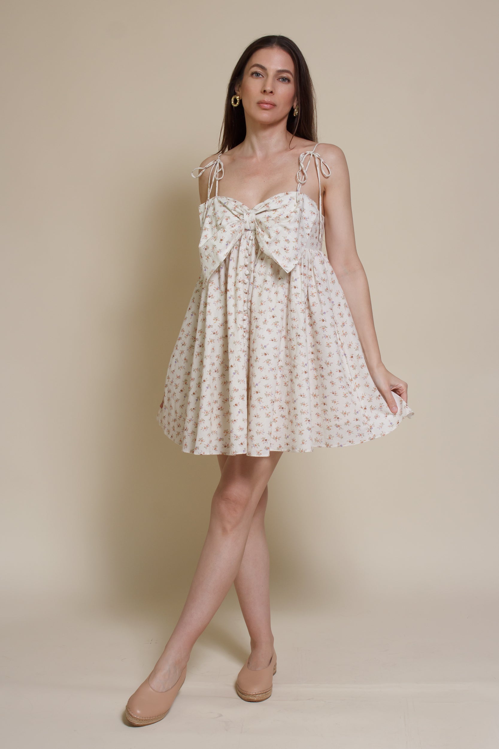 Storia ditsy floral bow front mini dress, in cream multi.
