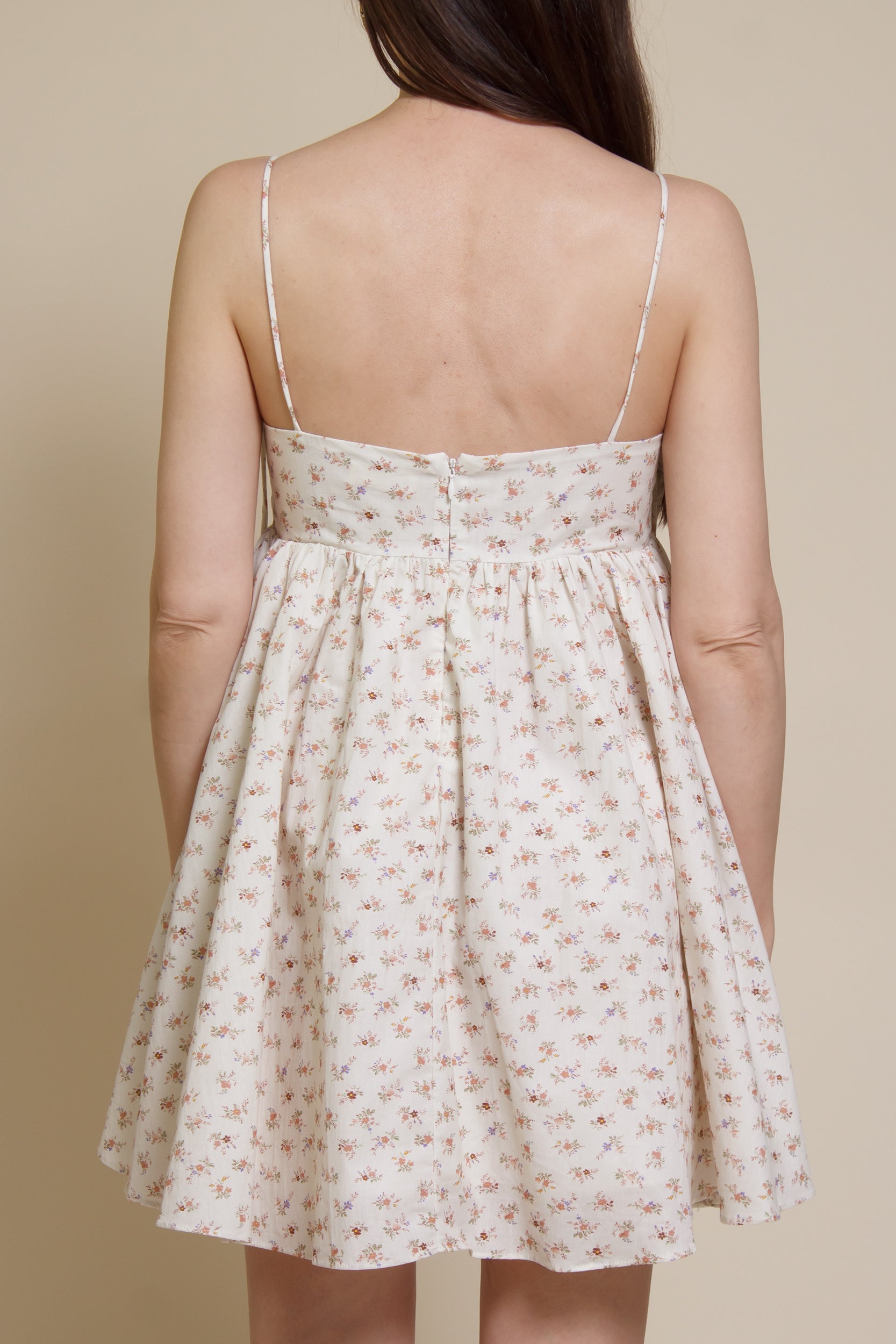 Storia ditsy floral bow front mini dress, in cream multi.