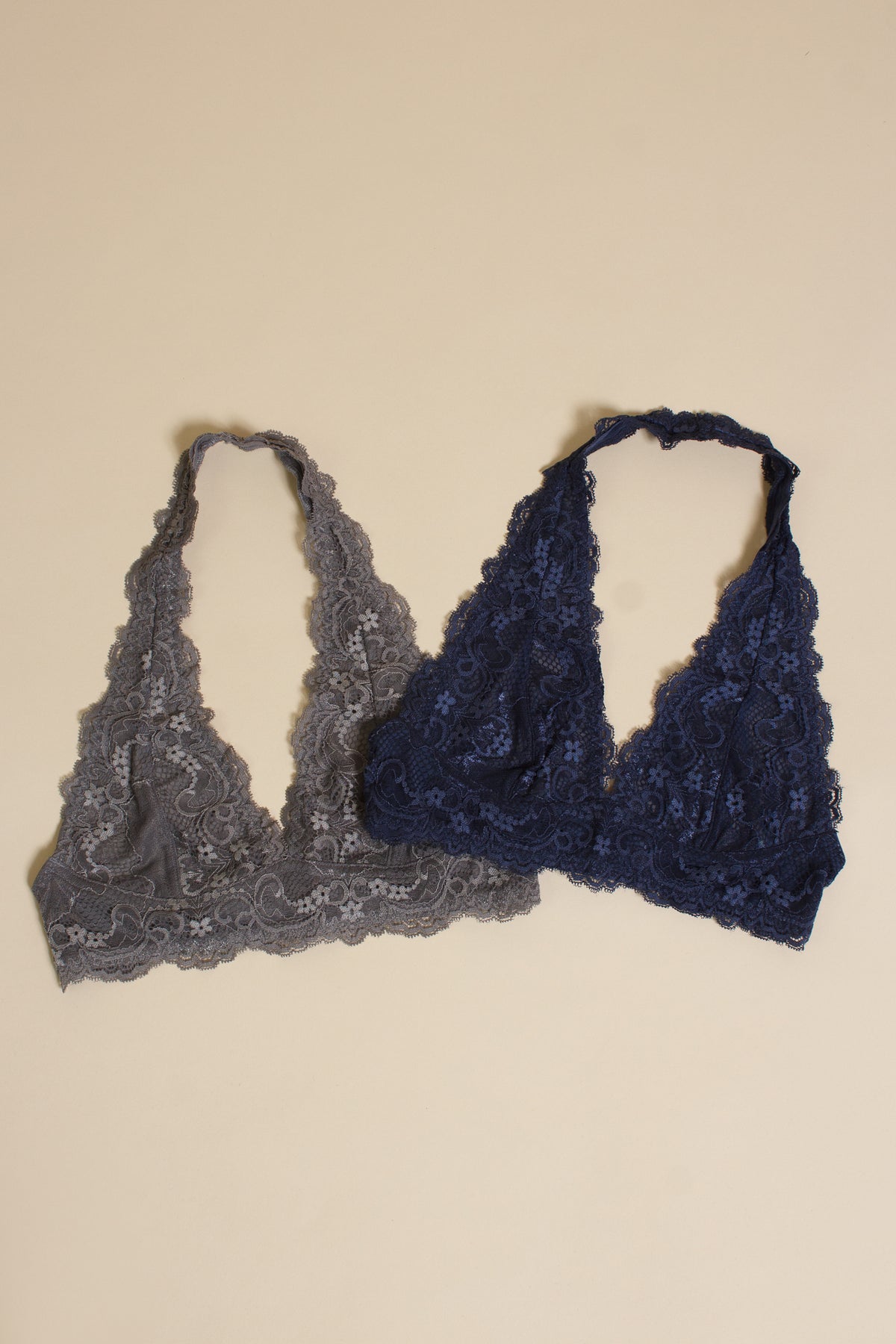 Wishlist lace halter bralette flatlay, in assorted colors.