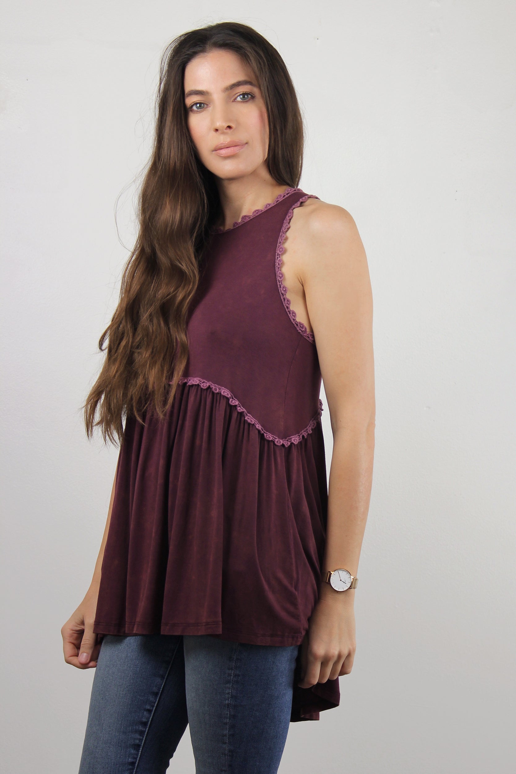 Babydoll style top, with exposed back zipper, in burgundy.