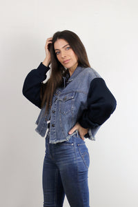 Cropped denim jacket with sweatshirt style sleeves. Image 2