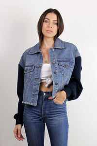 Cropped denim jacket with sweatshirt style sleeves. Image 5