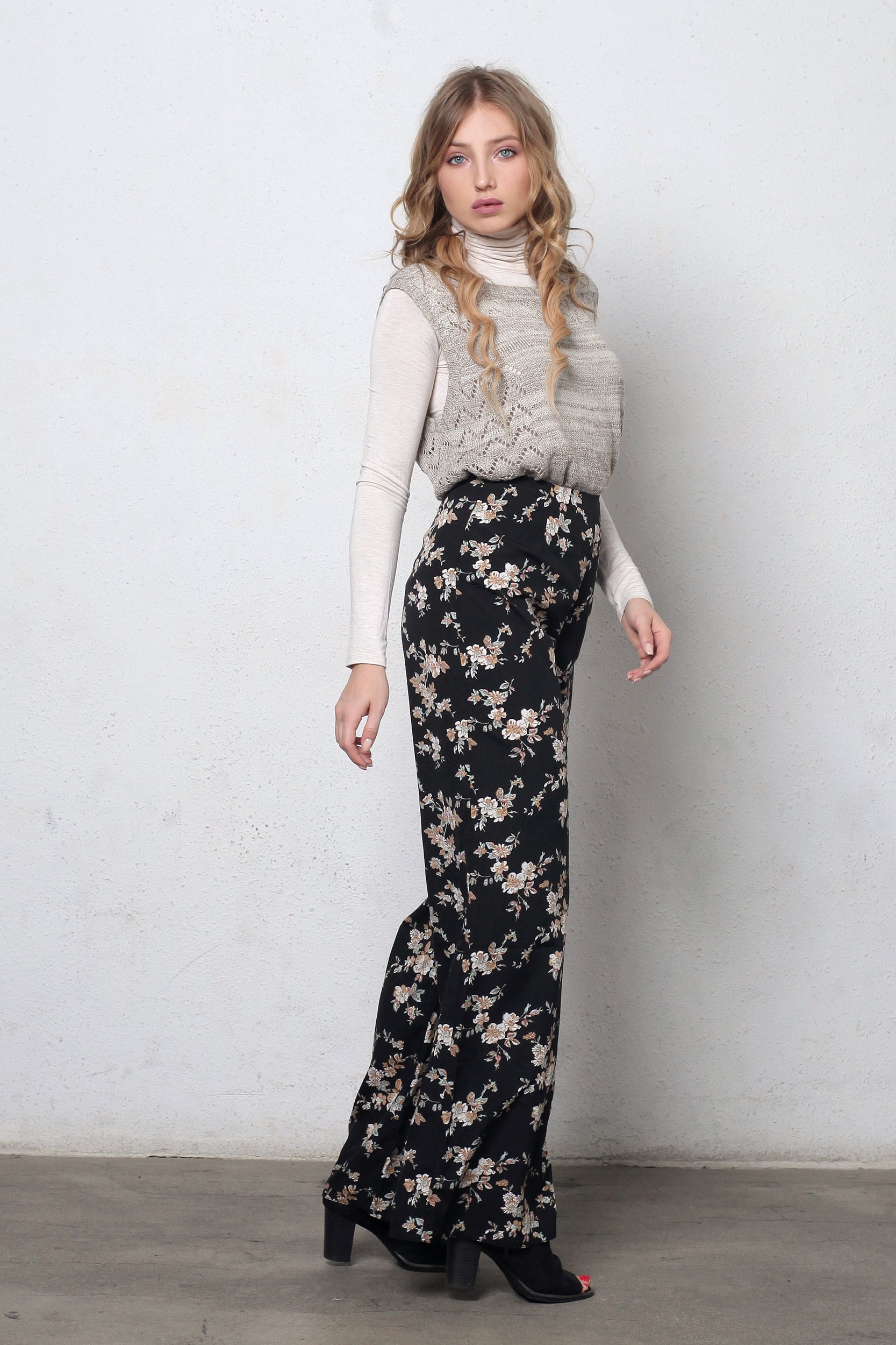 Wide leg, floral print pants, in black. Image 2