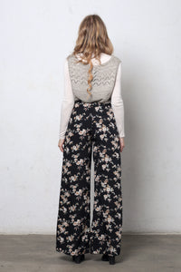 Wide leg, floral print pants, in black. Image 5
