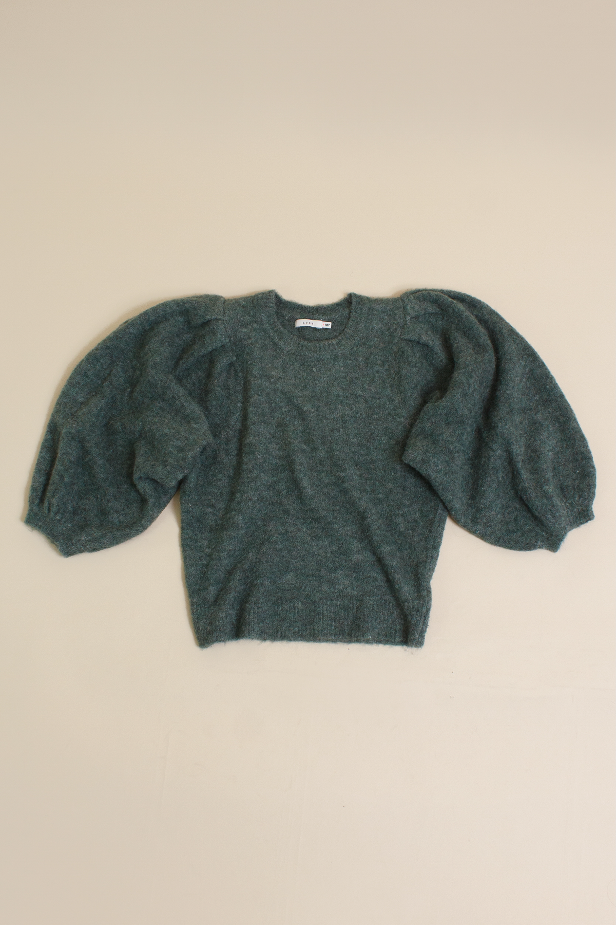 Lush Brand puff sleeve sweater, in pine.
