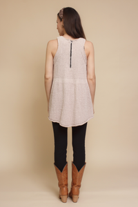 Babydoll sleeveless sweater with back zipper, in beige.