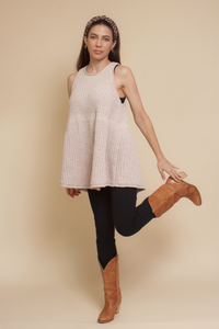 Babydoll sleeveless sweater with back zipper, in beige.