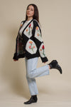 Bailey Rose diamond floral button front cardigan, in black.