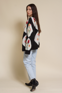 Bailey Rose diamond floral button front cardigan, in black.