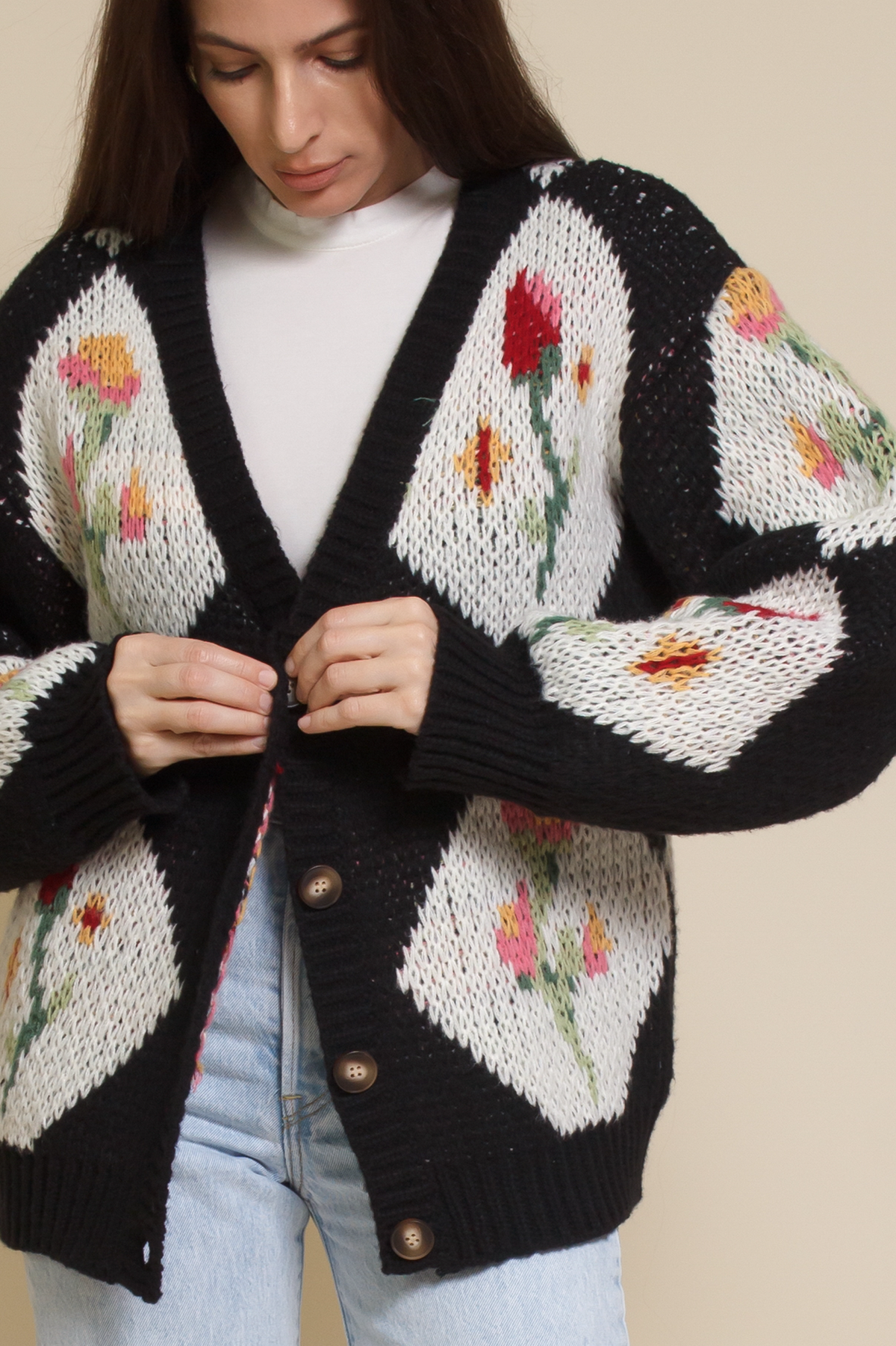 Bailey Rose diamond floral button front cardigan, in black.