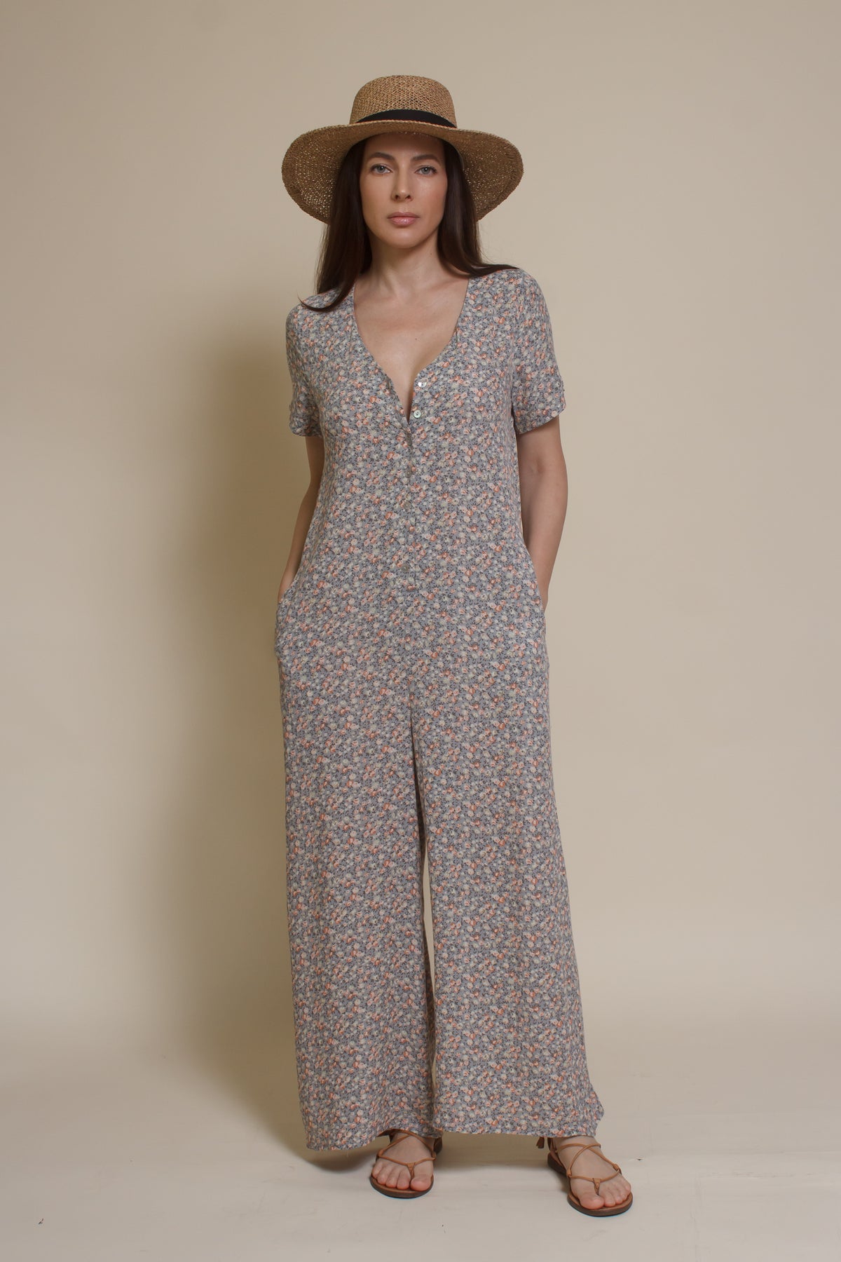 Calista short sleeve floral button up jumpsuit, in warm grey.