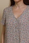 Calista short sleeve floral button up jumpsuit, in warm grey.