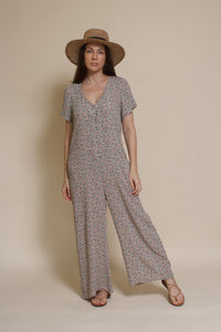Calista short sleeve floral button up jumpsuit, in warm grey.