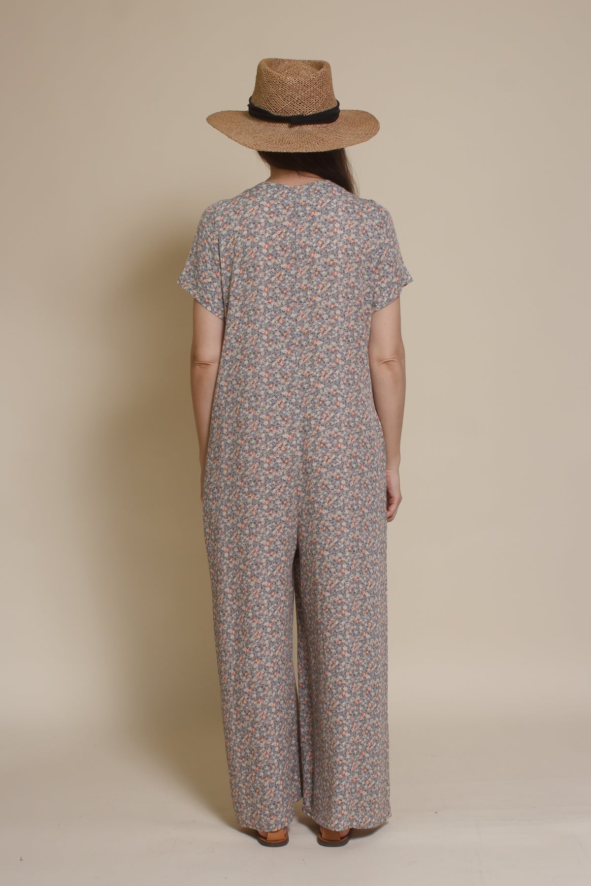 Calista short sleeve floral button up jumpsuit, in warm grey.