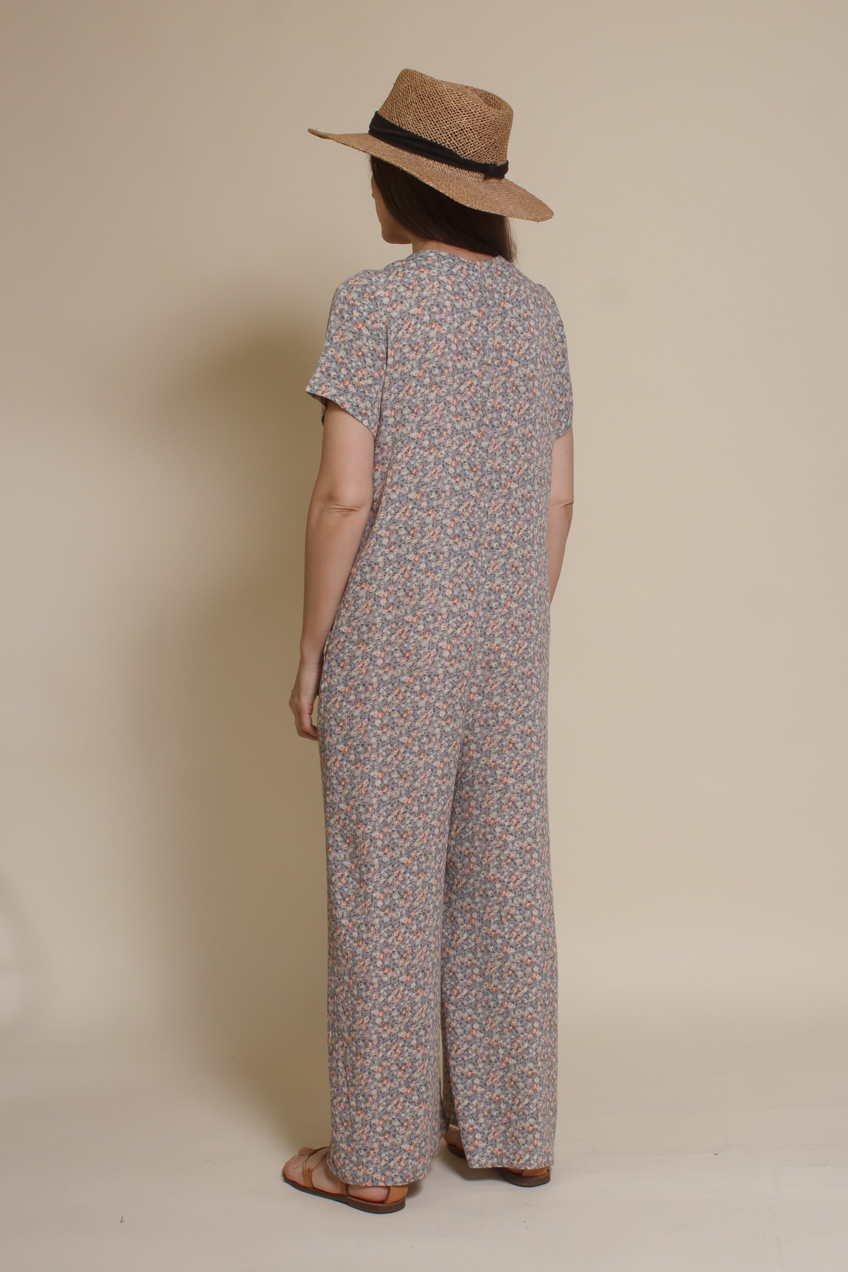 Calista short sleeve floral button up jumpsuit, in warm grey.