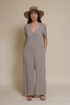 Calista short sleeve floral button up jumpsuit, in warm grey.