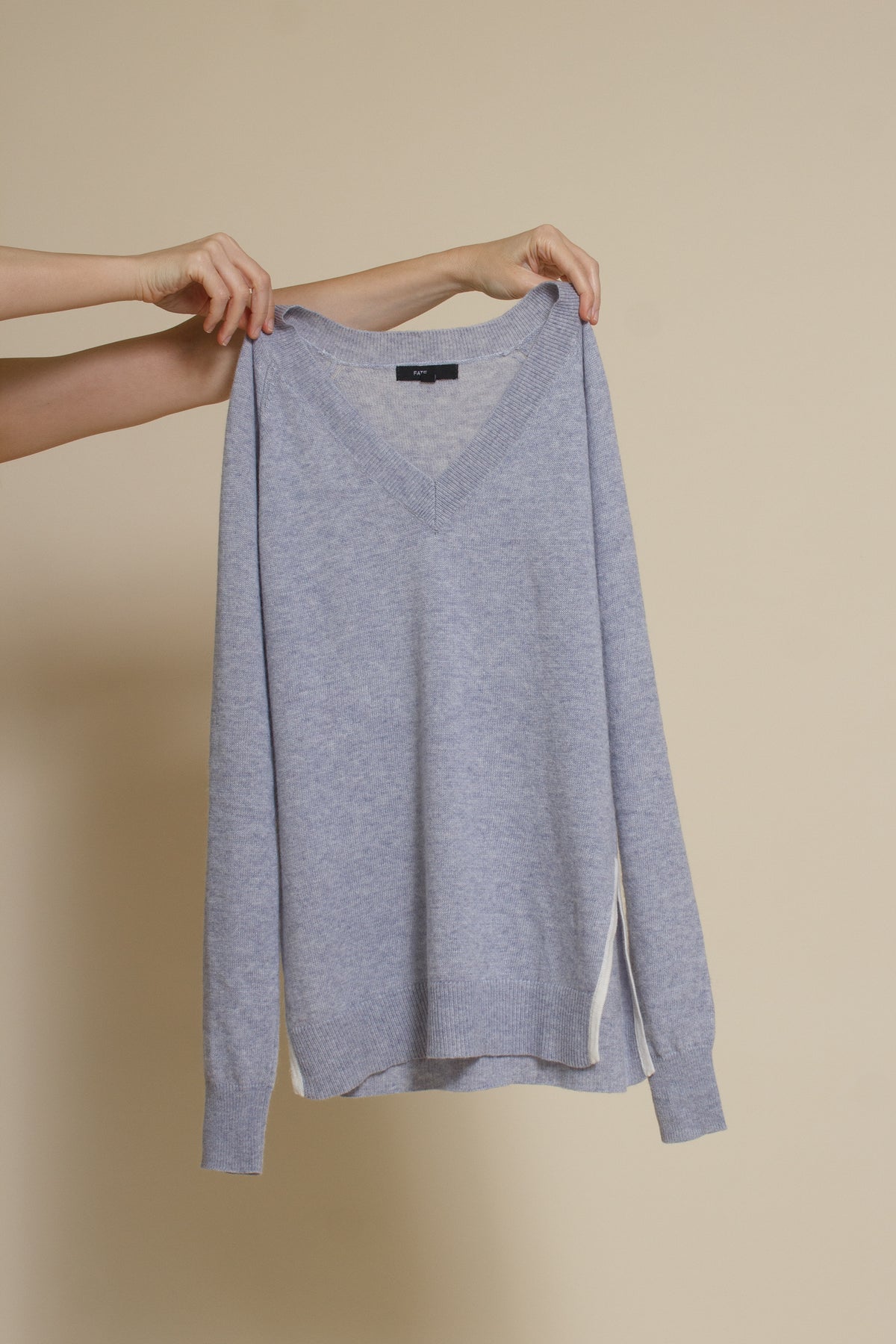 Fate classic v neck sweater with side slits, in heather blue.