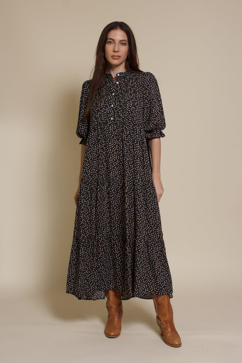 In Loom floral puff sleeve button front midi dress. Color: Black Floral