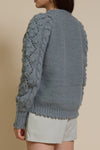 In Loom pointelle knit pom pom cardigan, in sage.