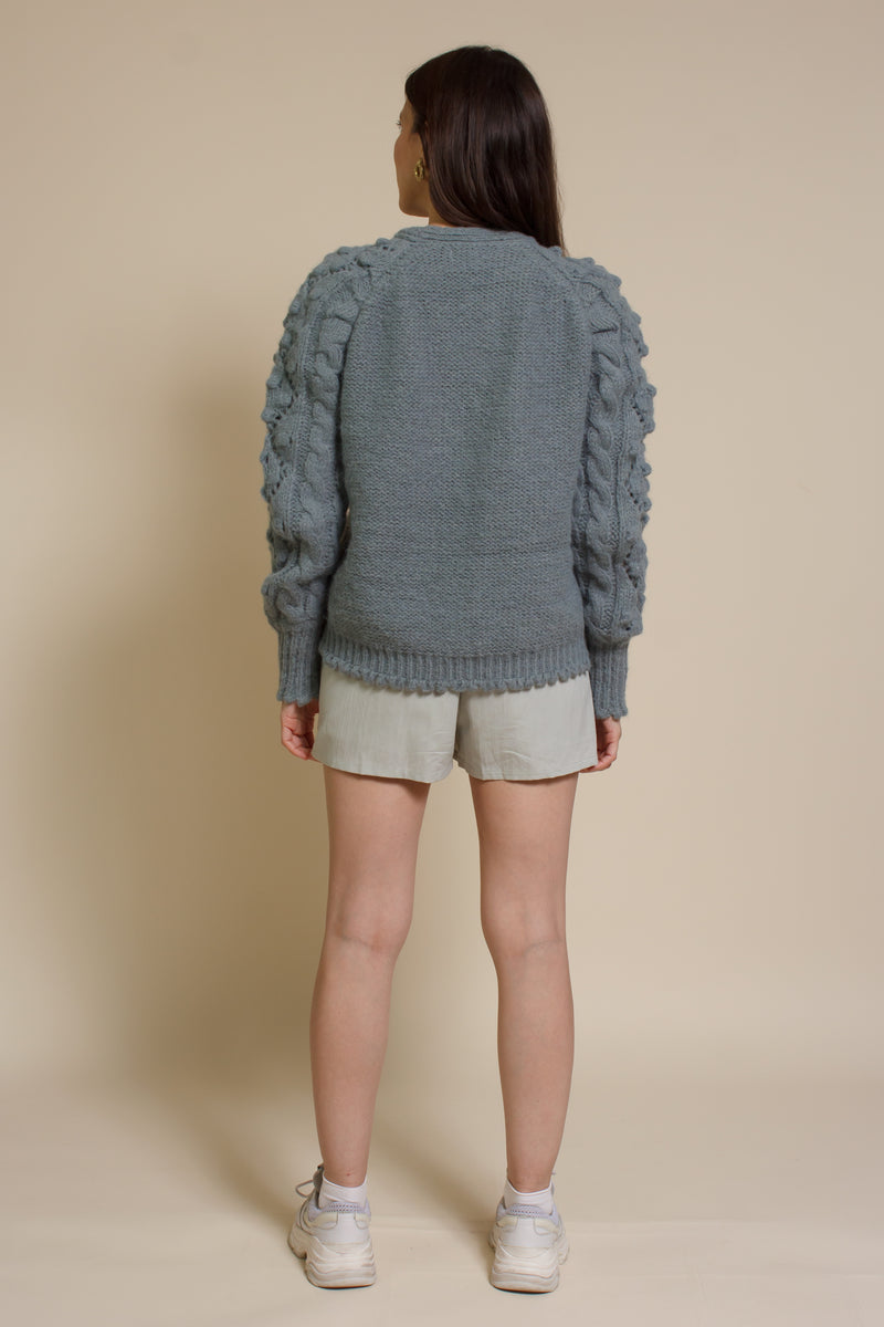 In Loom pointelle knit pom pom cardigan, in sage.