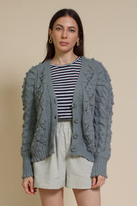 In Loom pointelle knit pom pom cardigan, in sage.