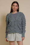 In Loom pointelle knit pom pom cardigan, in sage.