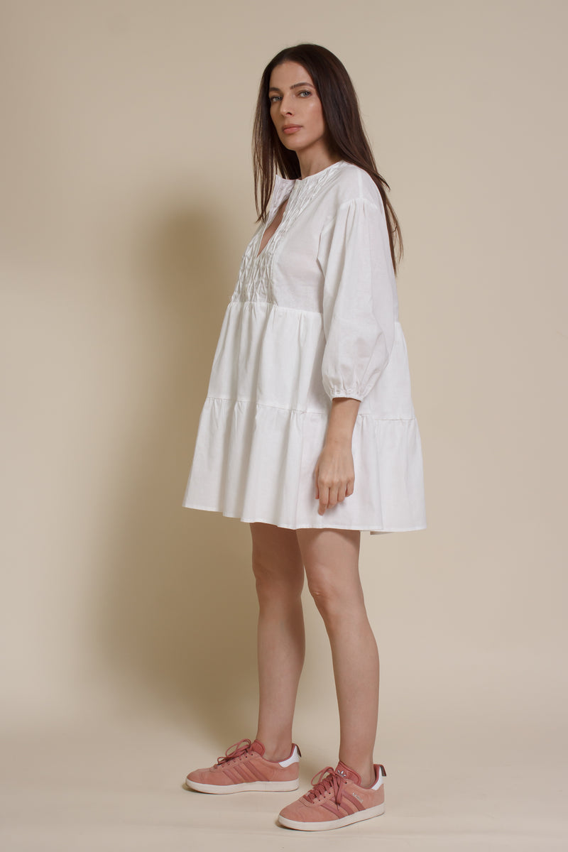 Lalavon mini shirt dress with partial button front, in off white.