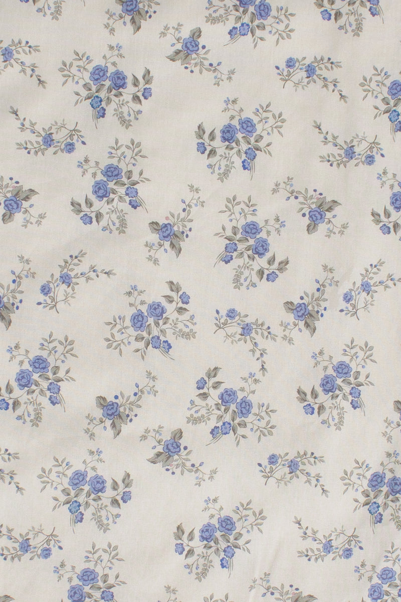 Storia short sleeve smocked midi dress, in blue floral. (fabric swatch)