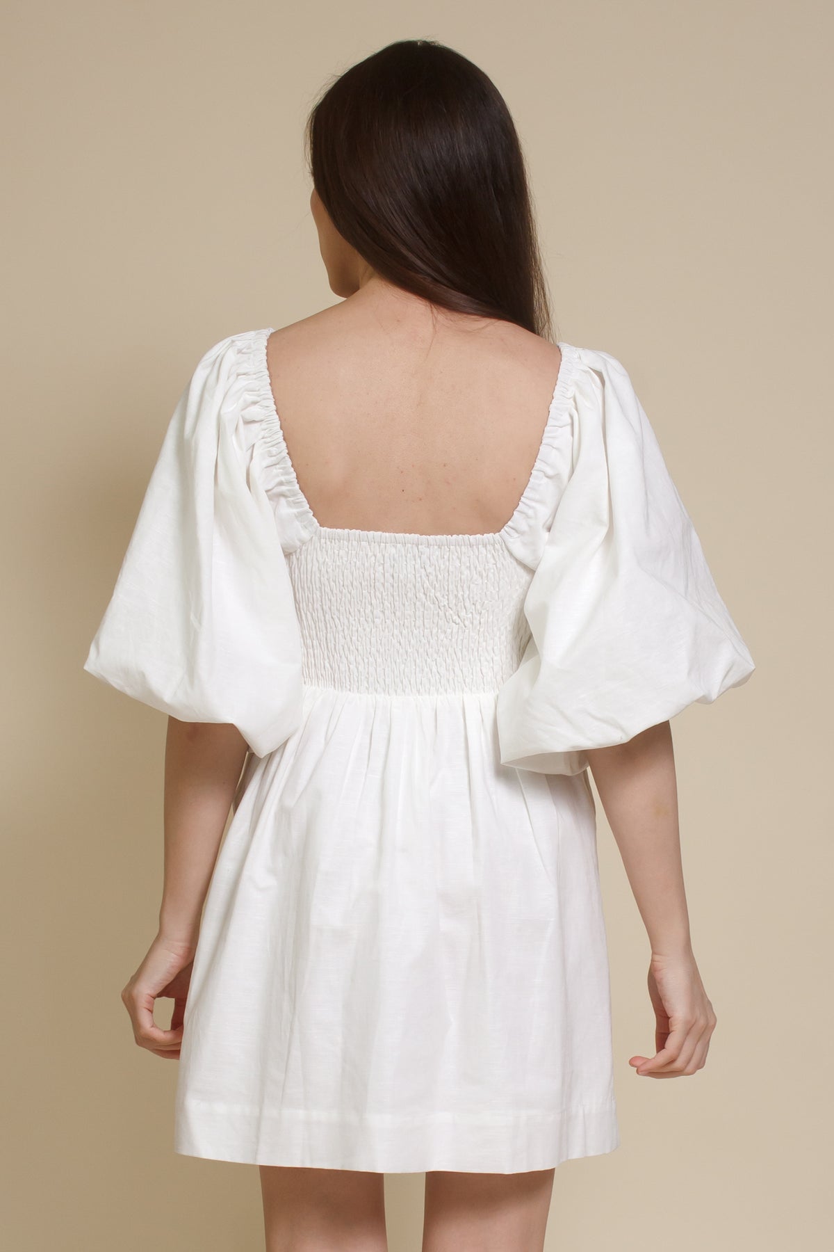 Miou Muse puff sleeve cotton/linen mini dress with smocked back, in off white.