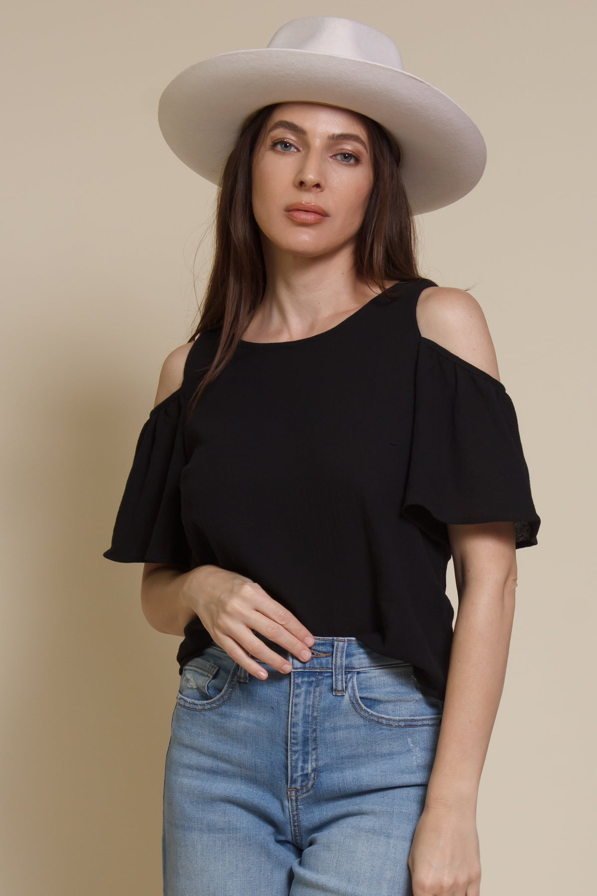 Mod Ref Tamia Top. Open back short sleeve blouse with buttons and tie closure. Color: Black