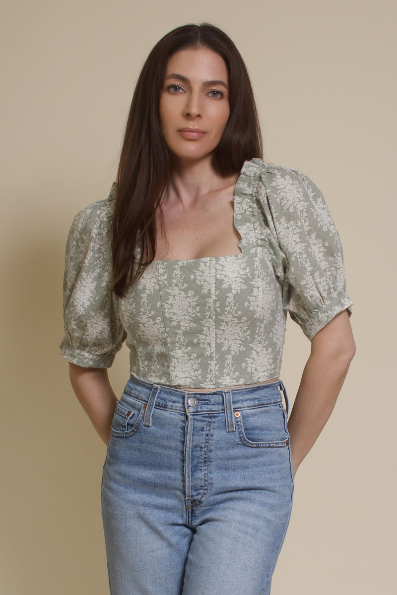 Olivaceous floral jacquard corset top with puff sleeves, in sage cream. 