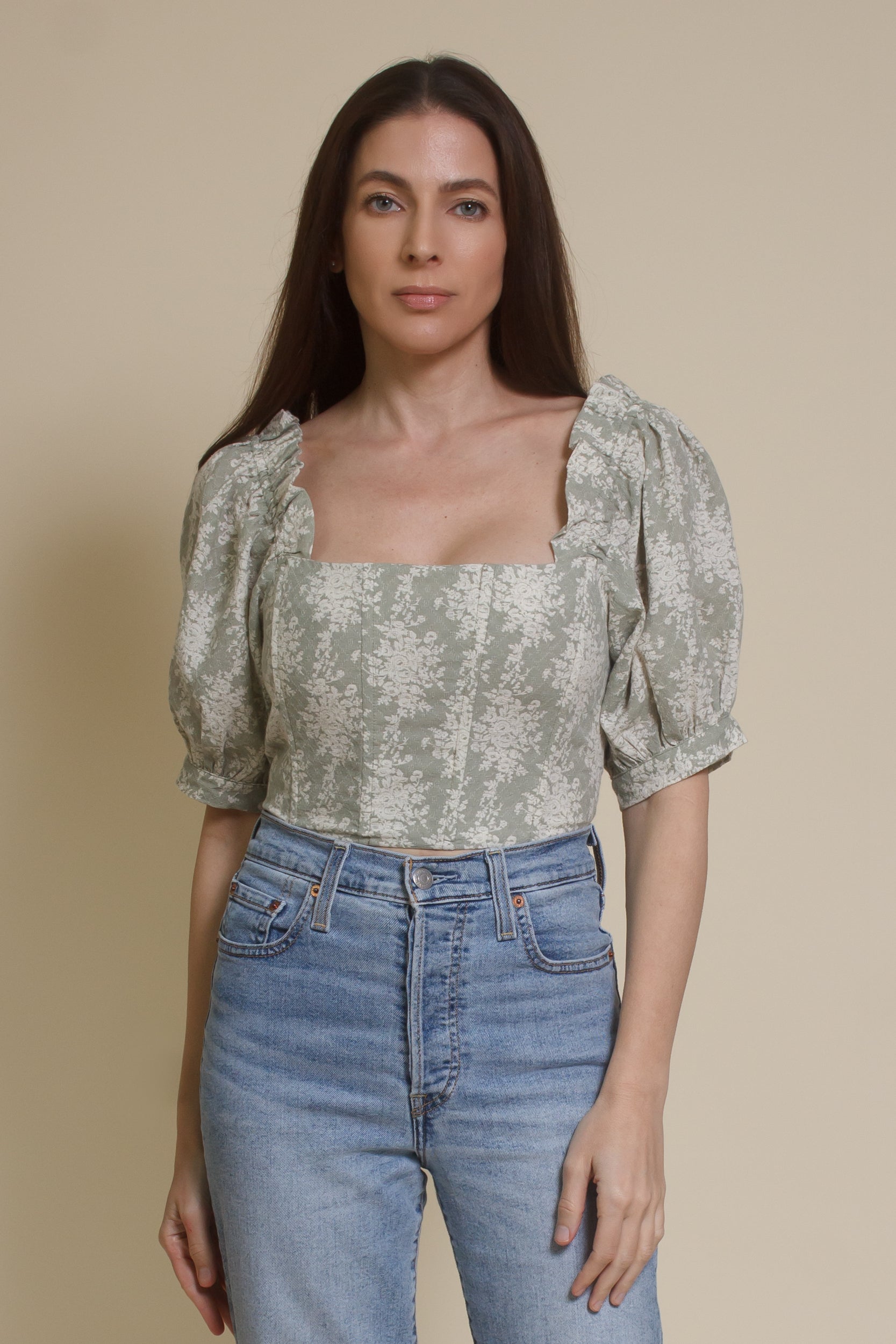 Olivaceous floral jacquard corset top with puff sleeves, in sage cream.