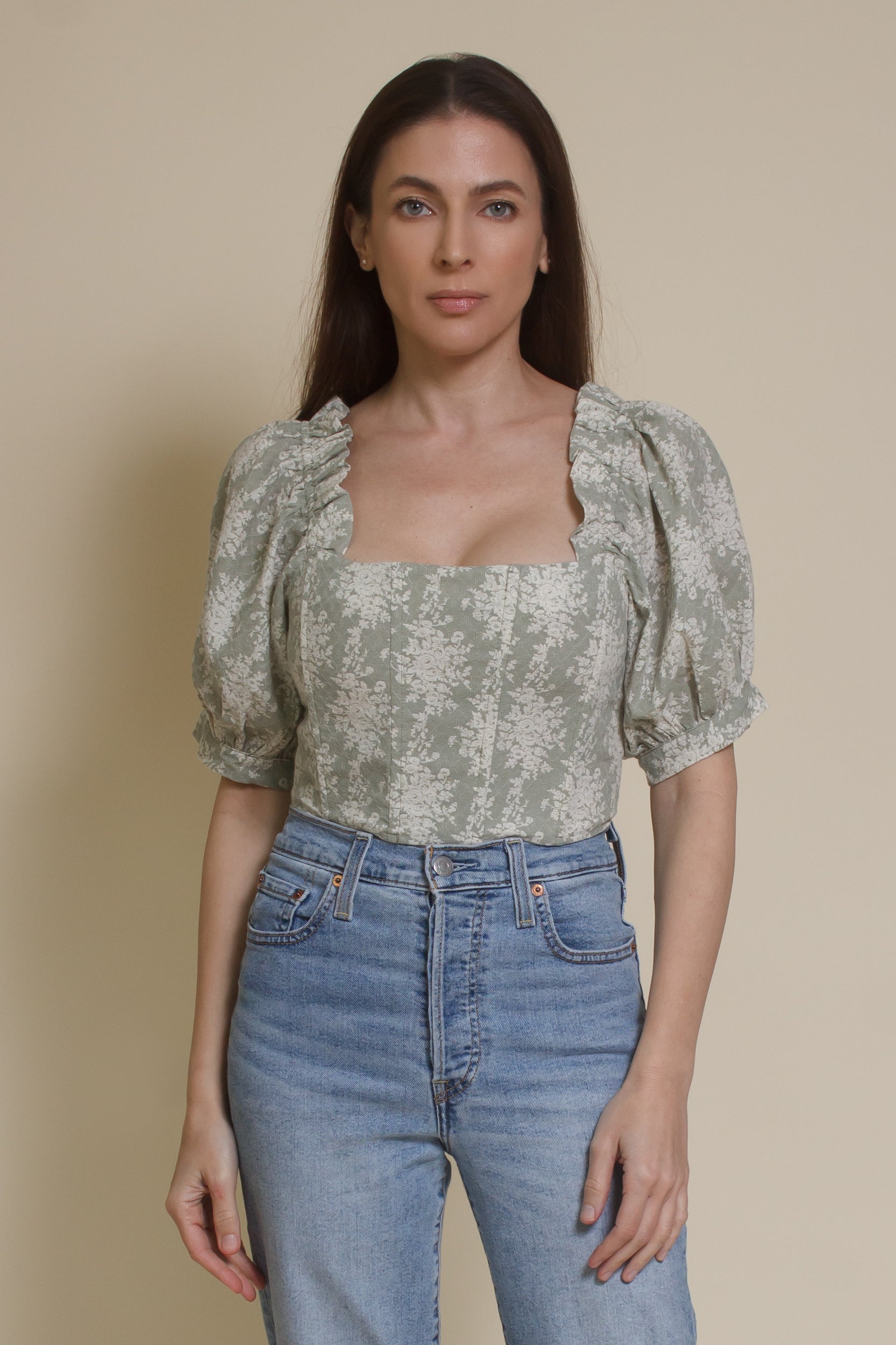 Olivaceous floral jacquard corset top with puff sleeves, in sage cream.