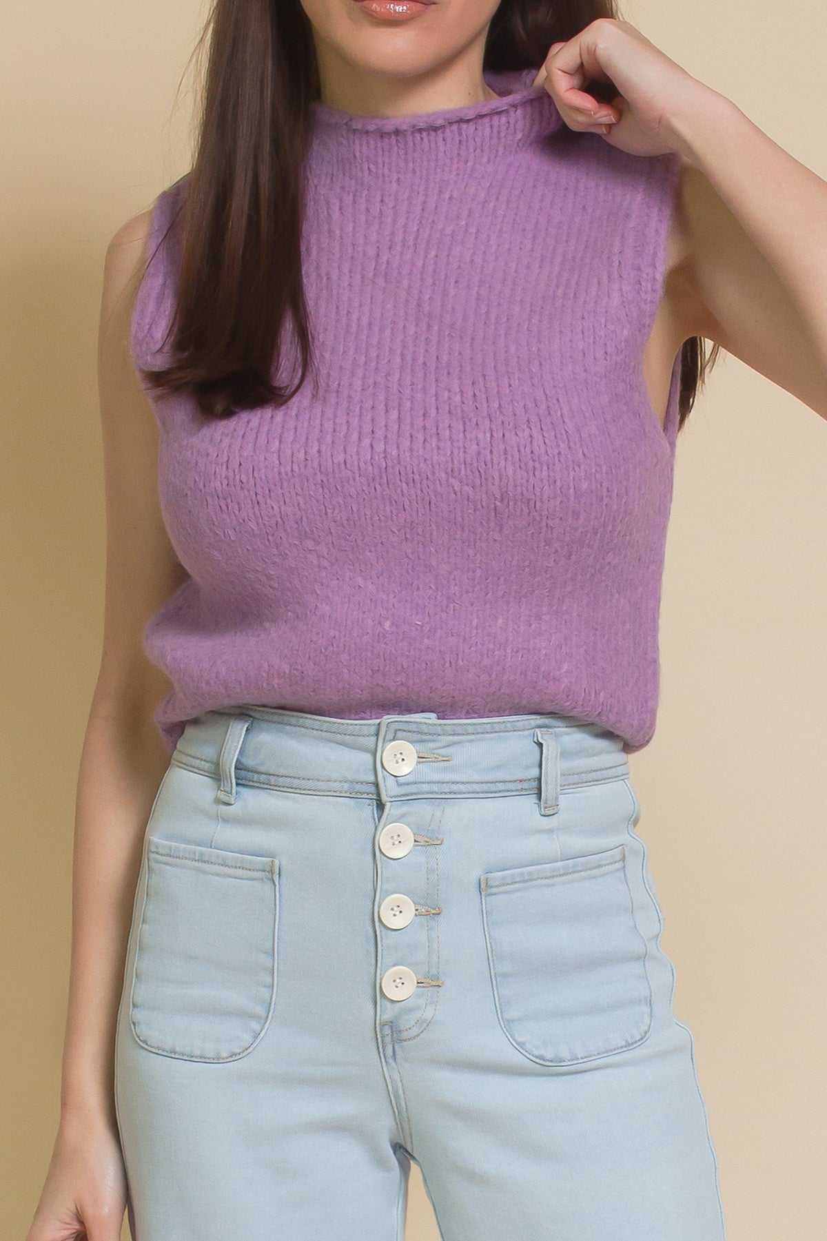 Sleeveless mock neck sweater, in purple.
