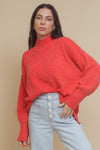 La Miel mock neck slouchy sweater, in tomato red.
