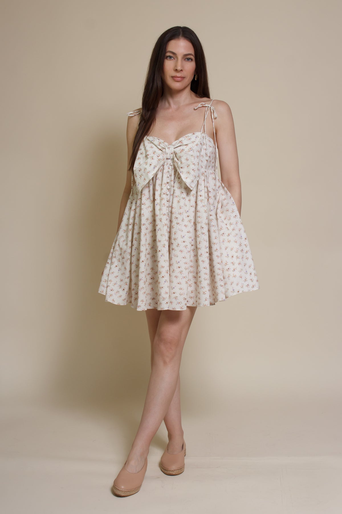 Storia ditsy floral bow front mini dress, in cream multi.