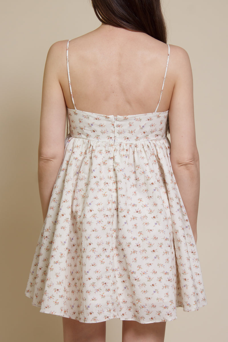 Storia ditsy floral bow front mini dress, in cream multi.