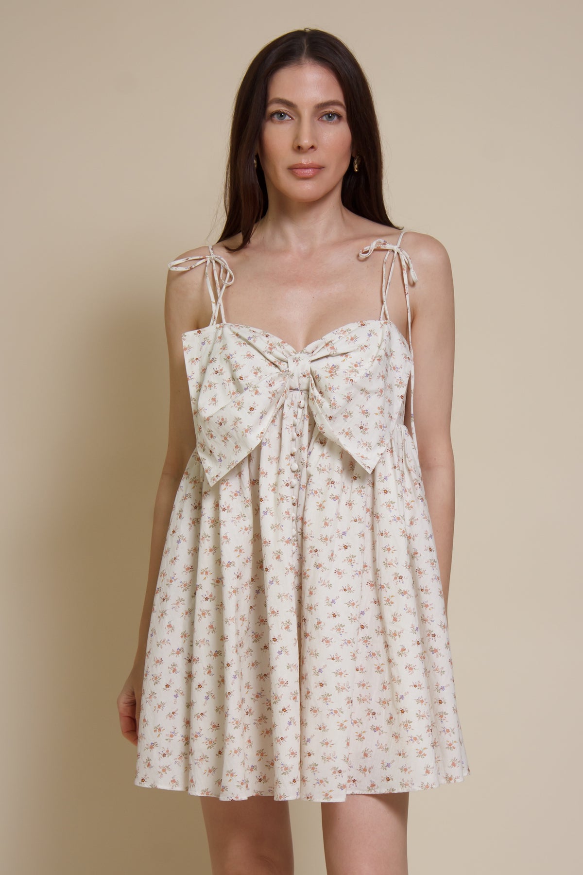 Storia ditsy floral bow front mini dress, in cream multi.