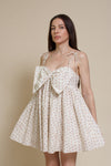 Storia ditsy floral bow front mini dress, in cream multi.